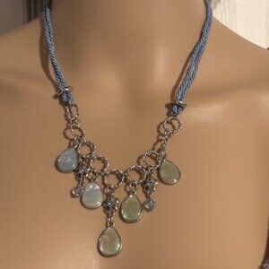 Elegant Double-Corded Necklace with Green Gems & Silver Floral Accents